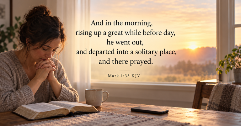 Woman praying beside an open Bible at sunrise with Mark 1:35 overlaid: “And in the morning… he went out… and there prayed.”